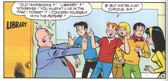 Mr Weatherbee in front of the Riverdale High library